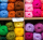 shelves with colorful yarn balls in store